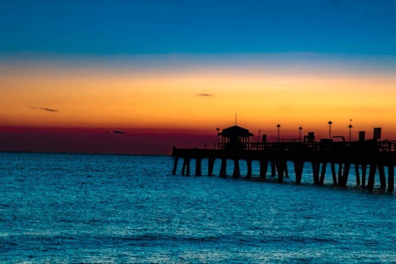 Long exposure of Fort Lauderdale sunrise — waves crashing in soft golden light